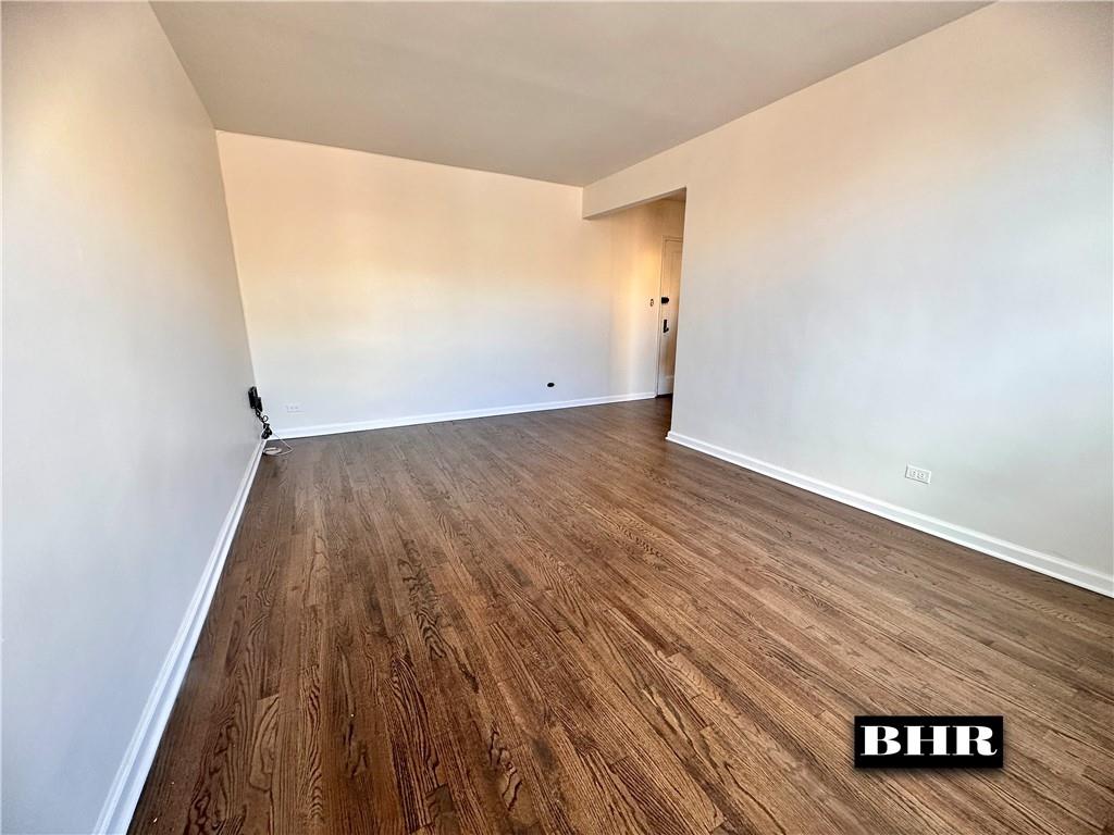 2615 Homecrest Avenue, Unit 6B Brooklyn, NY 11235 - Photo 4 of 17 an empty room with wooden floor