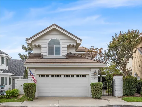 a front view of a house with a garage