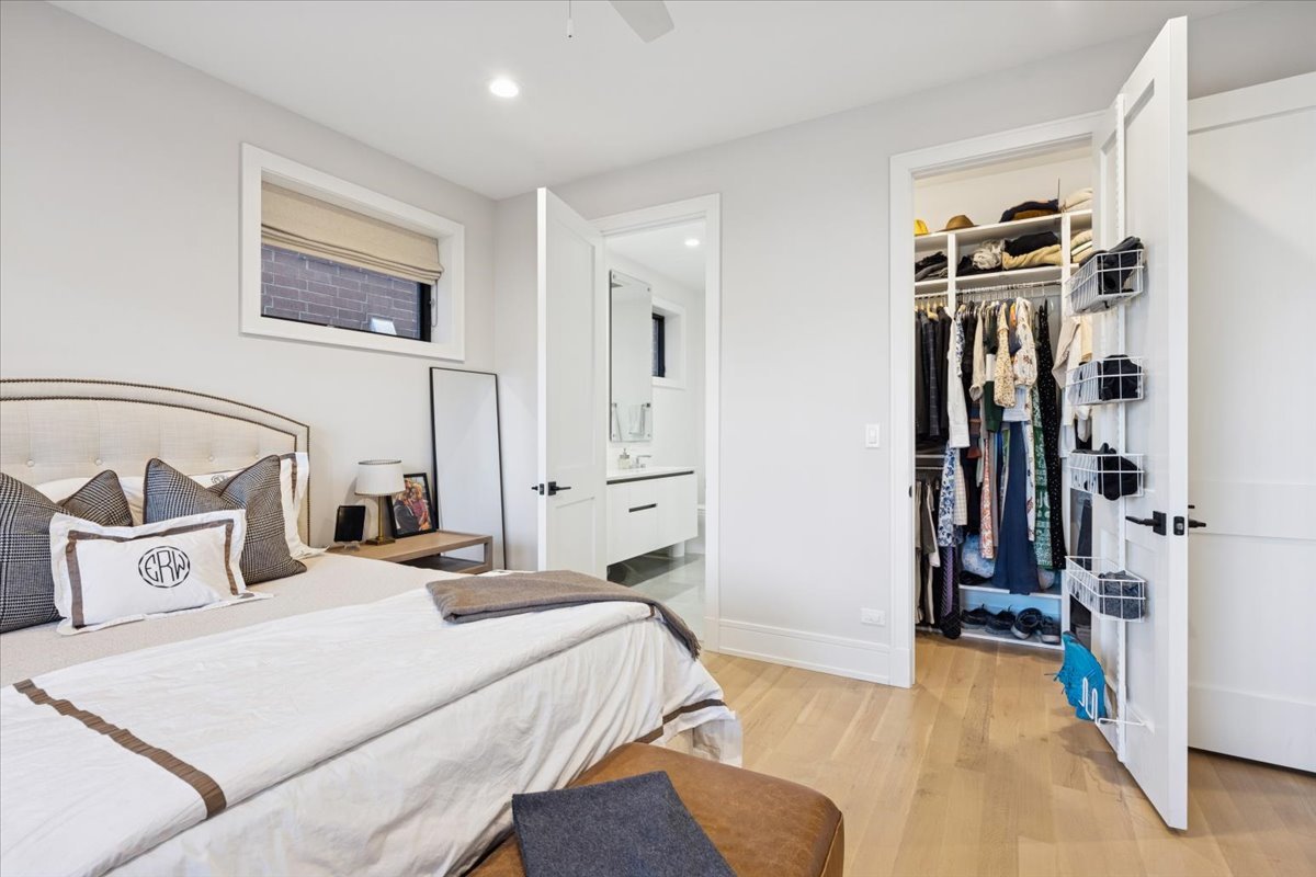 2228 West Belmont Avenue, Unit 2 Chicago, IL 60618 - Photo 11 of 18 a bedroom with a bed and walk in closet