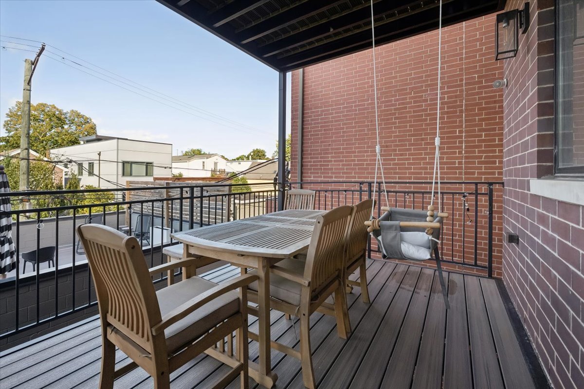 2228 West Belmont Avenue, Unit 2 Chicago, IL 60618 - Photo 17 of 18 a view of a balcony with wooden floor
