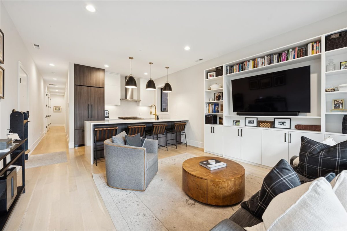 2228 West Belmont Avenue, Unit 2 Chicago, IL 60618 - Photo 7 of 18 a living room with furniture and a flat screen tv