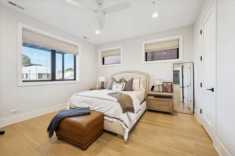 a bedroom with bed and window