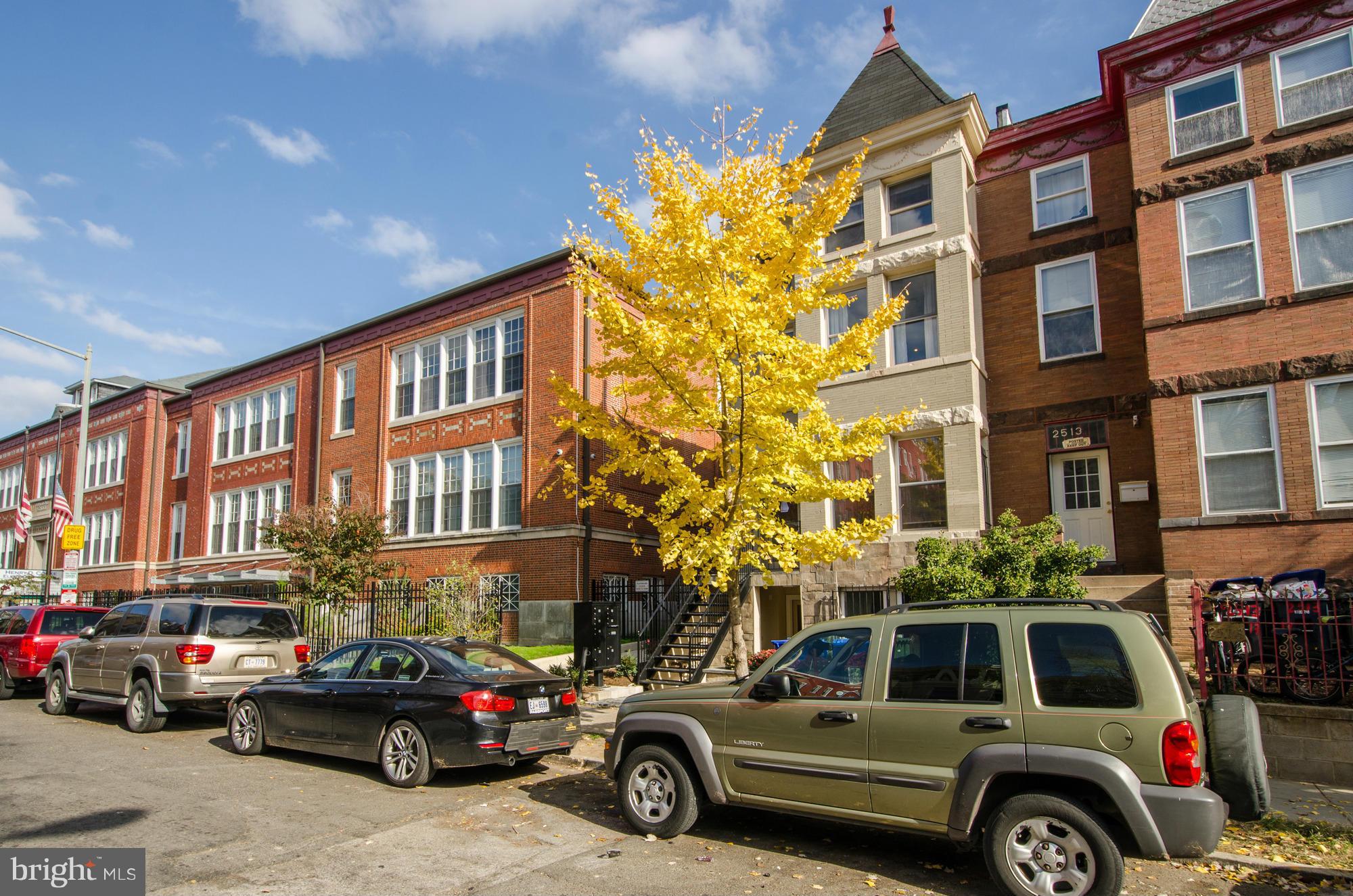 2515 17th Street Northwest, Unit 1 Washington, DC 20009 - Photo 12 of 12 a view of a cars is parked in front of a building