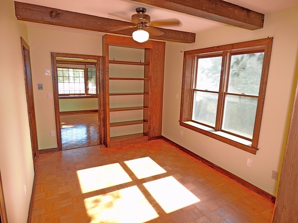 327 Union Street Randolph, MA 02368 - Photo 12 of 29 wooden floor in an empty room with a window