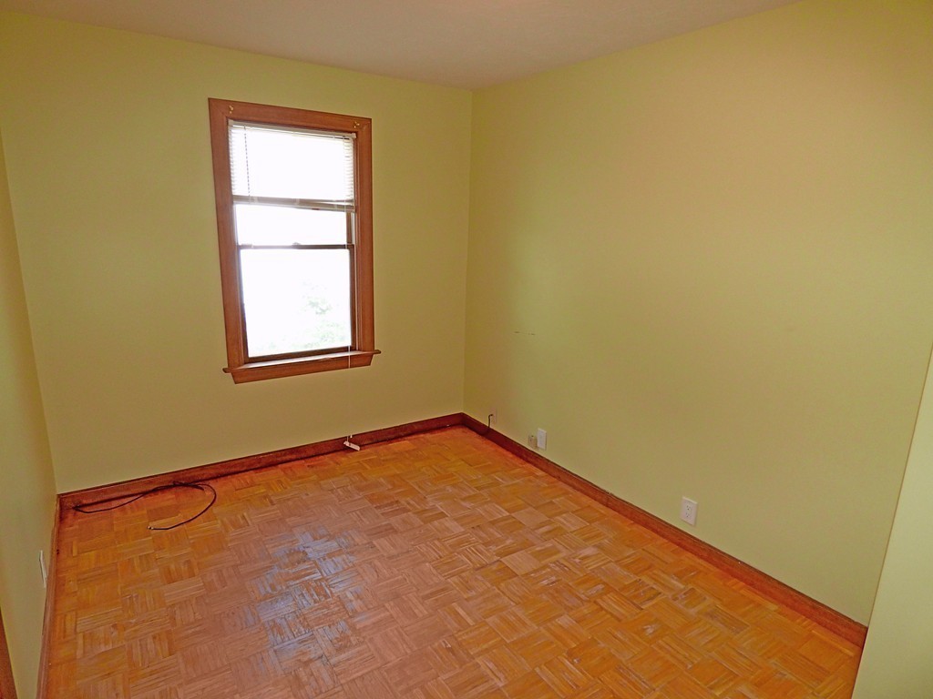 327 Union Street Randolph, MA 02368 - Photo 14 of 29 an empty room with a window