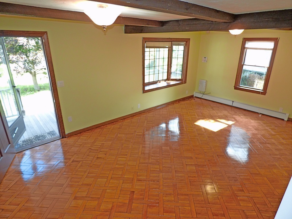 327 Union Street Randolph, MA 02368 - Photo 18 of 29 a view of empty room with windows