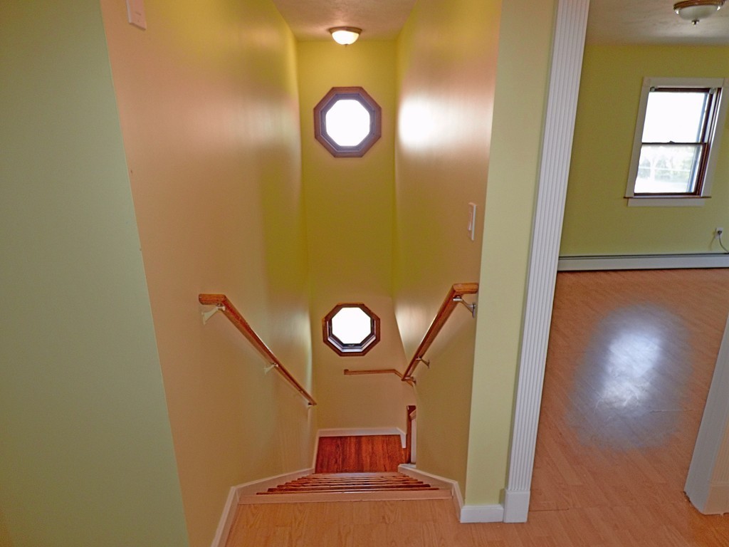 327 Union Street Randolph, MA 02368 - Photo 19 of 29 a view of a livingroom with window and hardwood floor