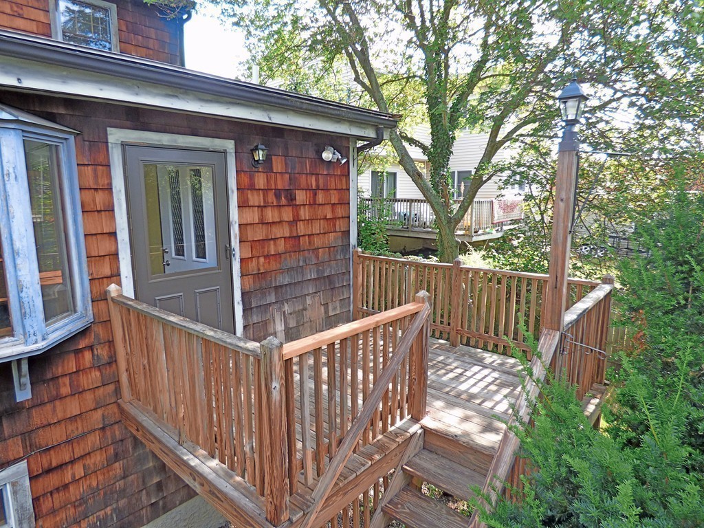 327 Union Street Randolph, MA 02368 - Photo 27 of 29 a view of a wooden fence and a yard