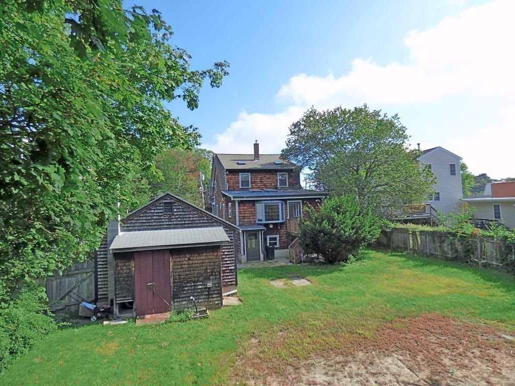 327 Union Street Randolph, MA 02368 - Photo 29 of 29 a view of a house with a yard