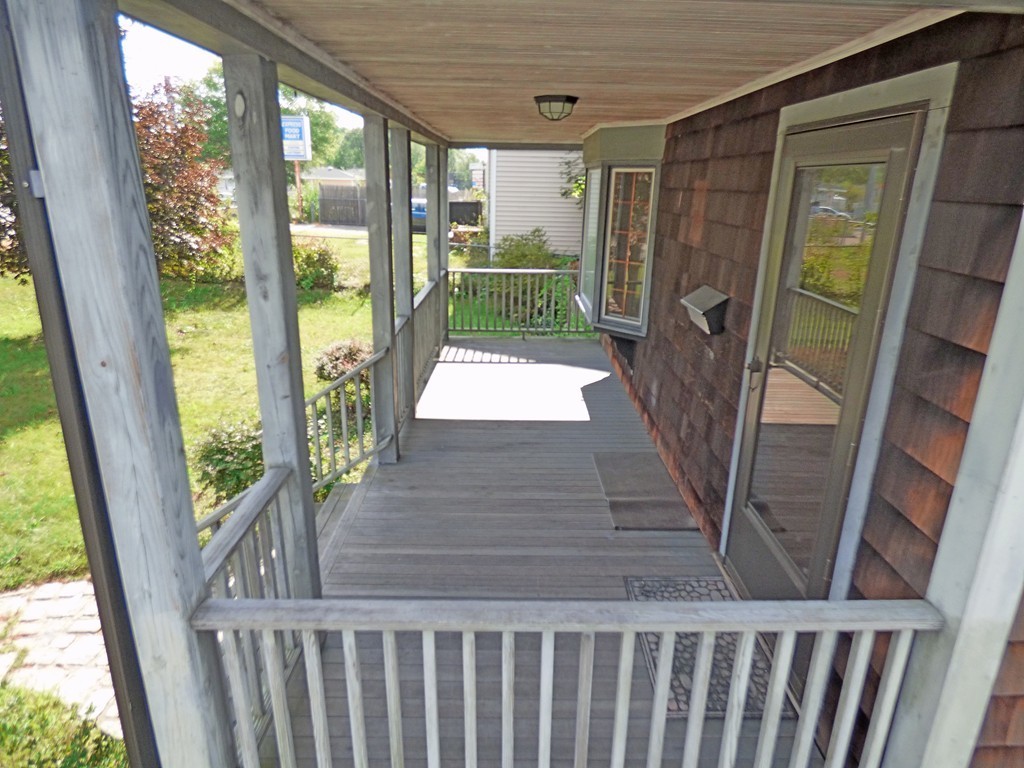 327 Union Street Randolph, MA 02368 - Photo 6 of 29 a view of entryway with wooden floor and door