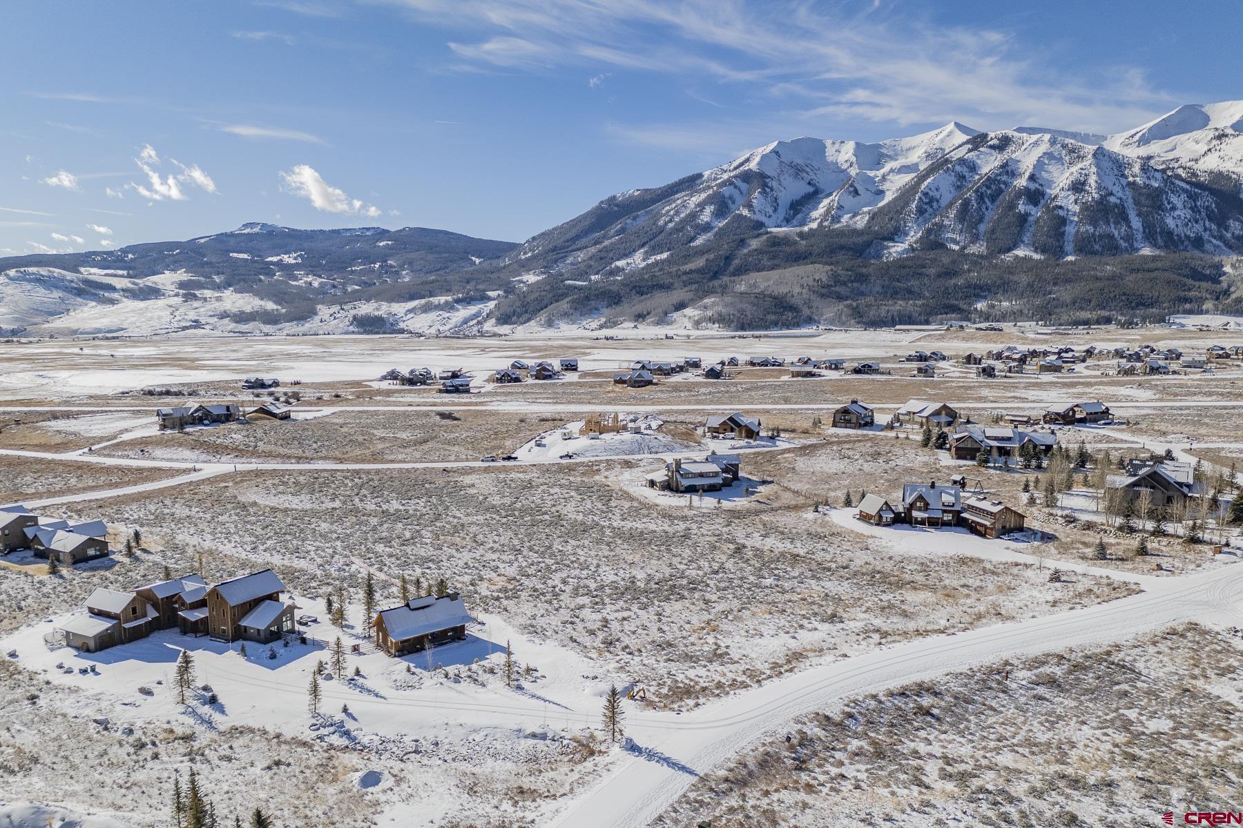 103 Buckhorn Way Crested Butte, CO 81224 - Photo 11 of 19 a view of a dry yard with wooden fence