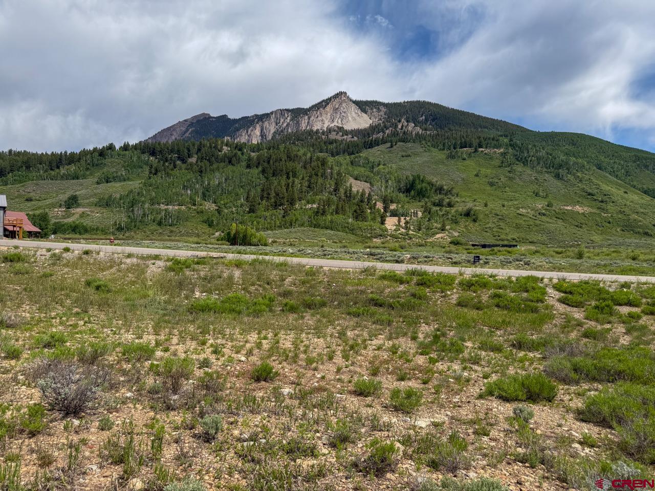 103 Buckhorn Way Crested Butte, CO 81224 - Photo 2 of 19 a view of a town with mountains in the background