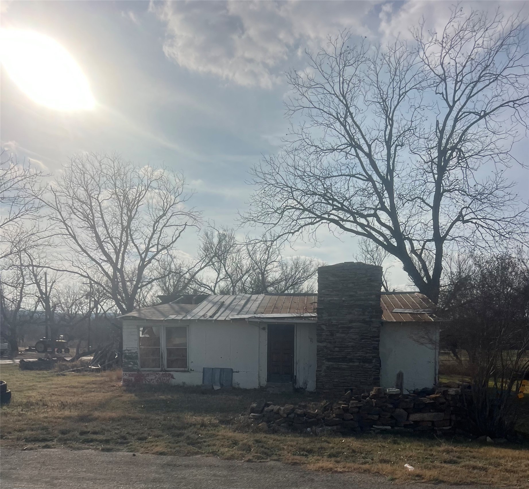 1110 Bluebonnet Road Mason, TX 76856 - Photo 2 of 11 Rear view of house with a metal roof