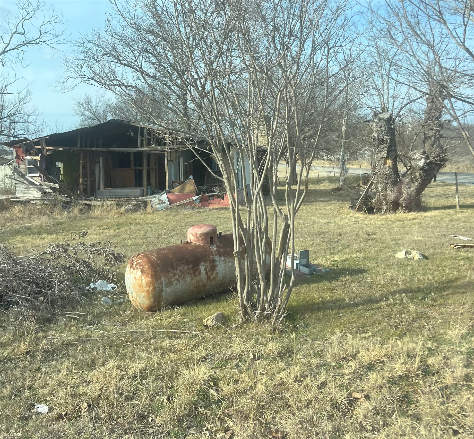 1110 Bluebonnet Road Mason, TX 76856 - Photo 9 of 11 View of grassy yard featuring a sunroom