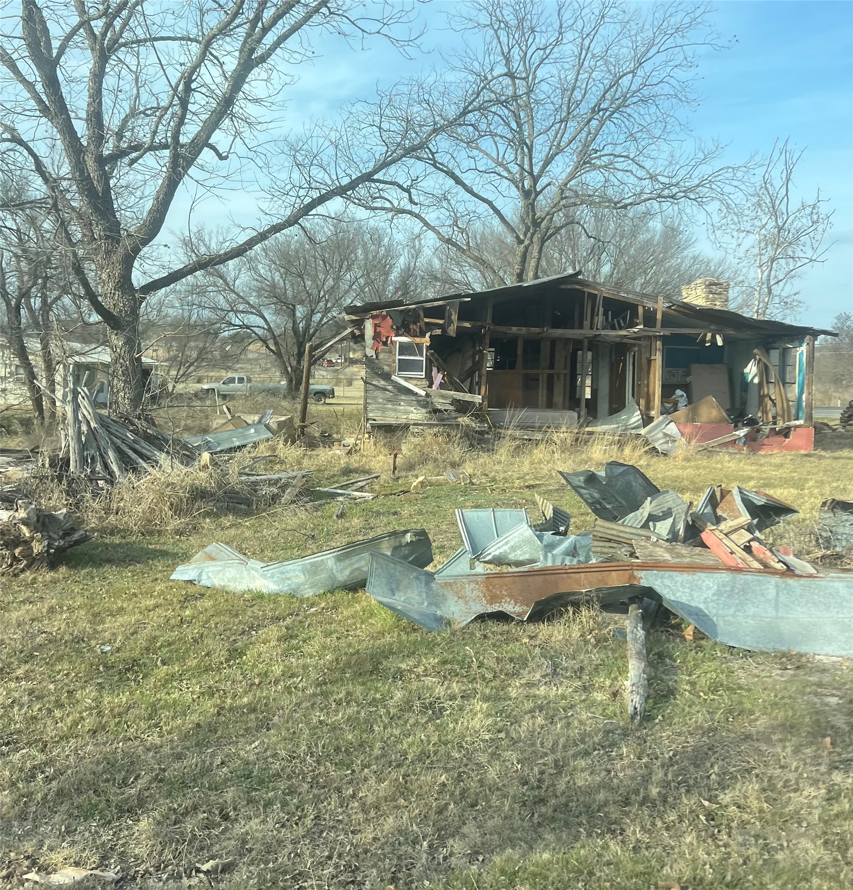 1110 Bluebonnet Road Mason, TX 76856 - Photo 10 of 11 Rear view of house featuring a chimney and a patio