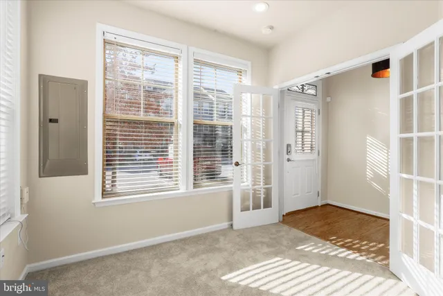 a view of a balcony with wooden floor