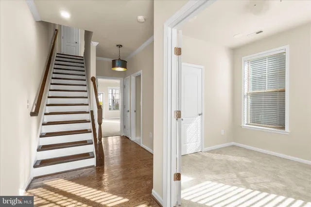 a view of a patio with dining table and chairs with a fire pit