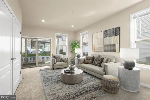 a spacious bedroom with a bed and window