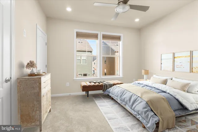 a view of livingroom with window fireplace and wooden floor