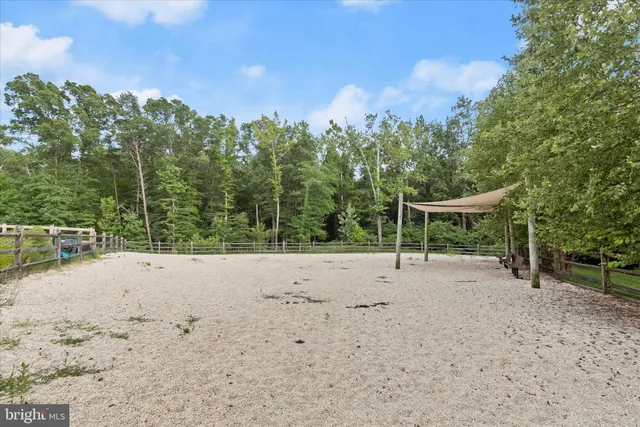 a room with furniture and a large window