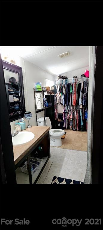 2208 Chenault Road, Unit L5 Cleveland, NC 27013 - Photo 6 of 9 a view of a room with lots of stuff