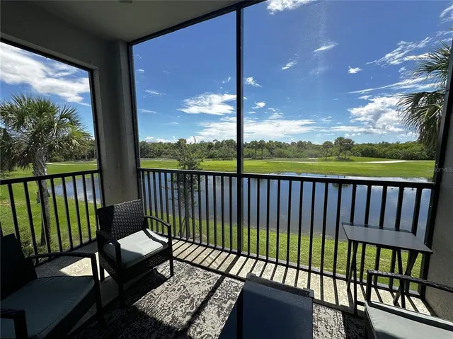 a view of a two chair in the balcony