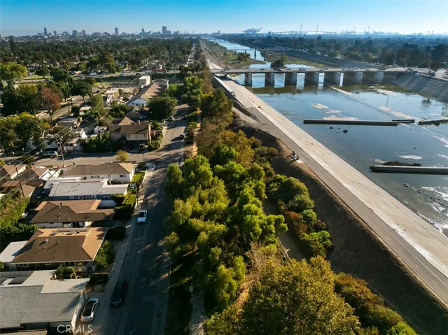 an aerial view of a house with a yard and a garage
