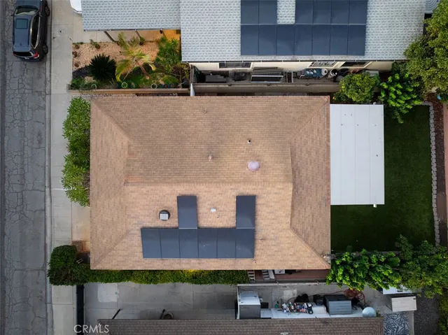 a view of a chair and table on the patio