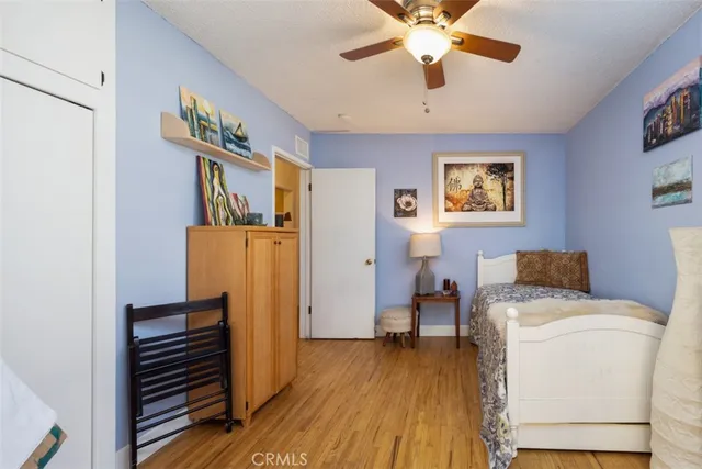 a workspace with furniture and wooden floor