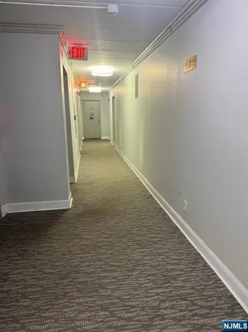 a view of hallway with an empty space