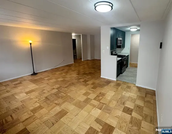 a view of a kitchen with a sink
