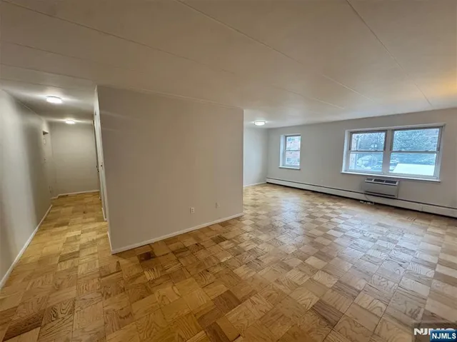 a view of an empty room and window