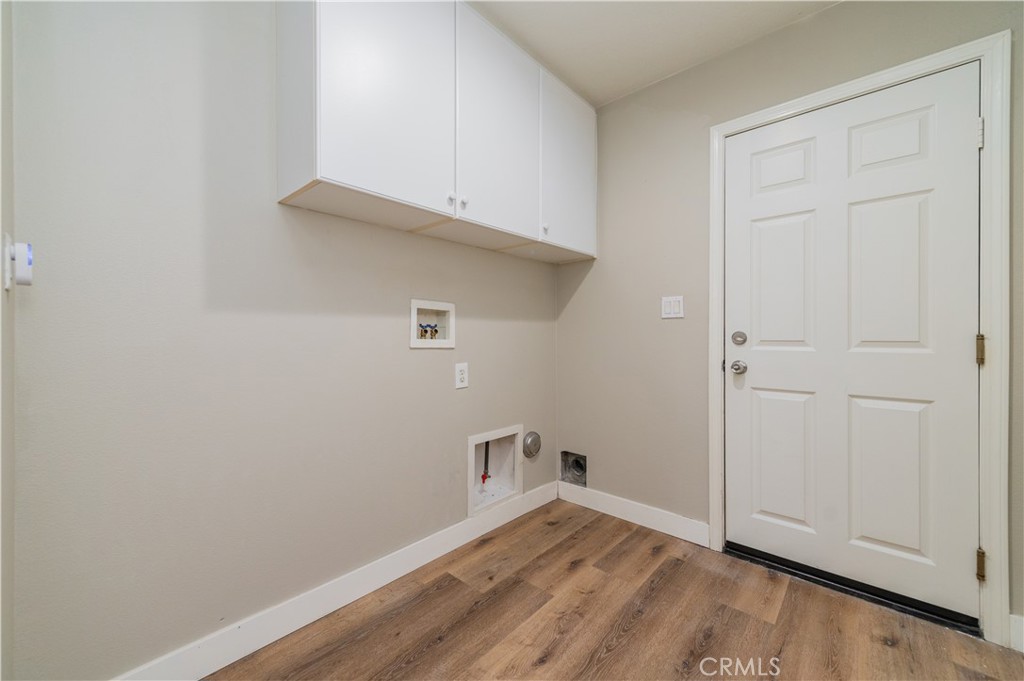 14236 Pointer Loop Eastvale, CA 92880 - Photo 18 of 38 a view of empty room with wooden floor
