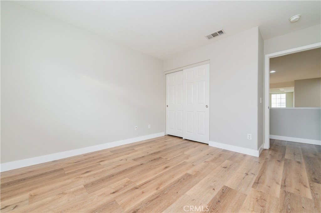 14236 Pointer Loop Eastvale, CA 92880 - Photo 23 of 38 wooden floor in a room