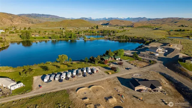 an aerial view of lake residential house with outdoor space