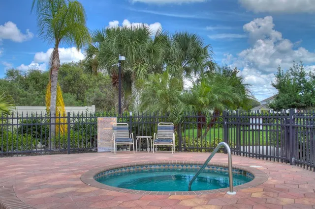 a view of a lake with a yard