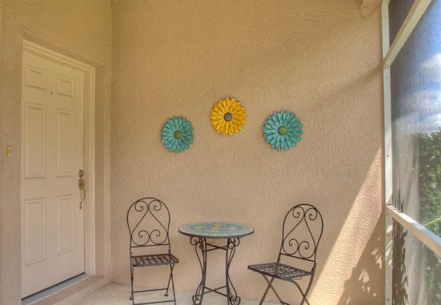 a living room with furniture a window and appliances