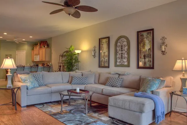 a living room with furniture and a window
