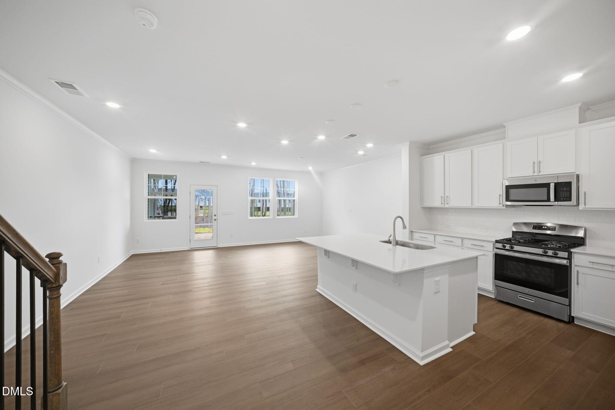 123 Tree Moss Court Rolesville, NC 27571 - Photo 13 of 33 a view of kitchen with sink and microwave