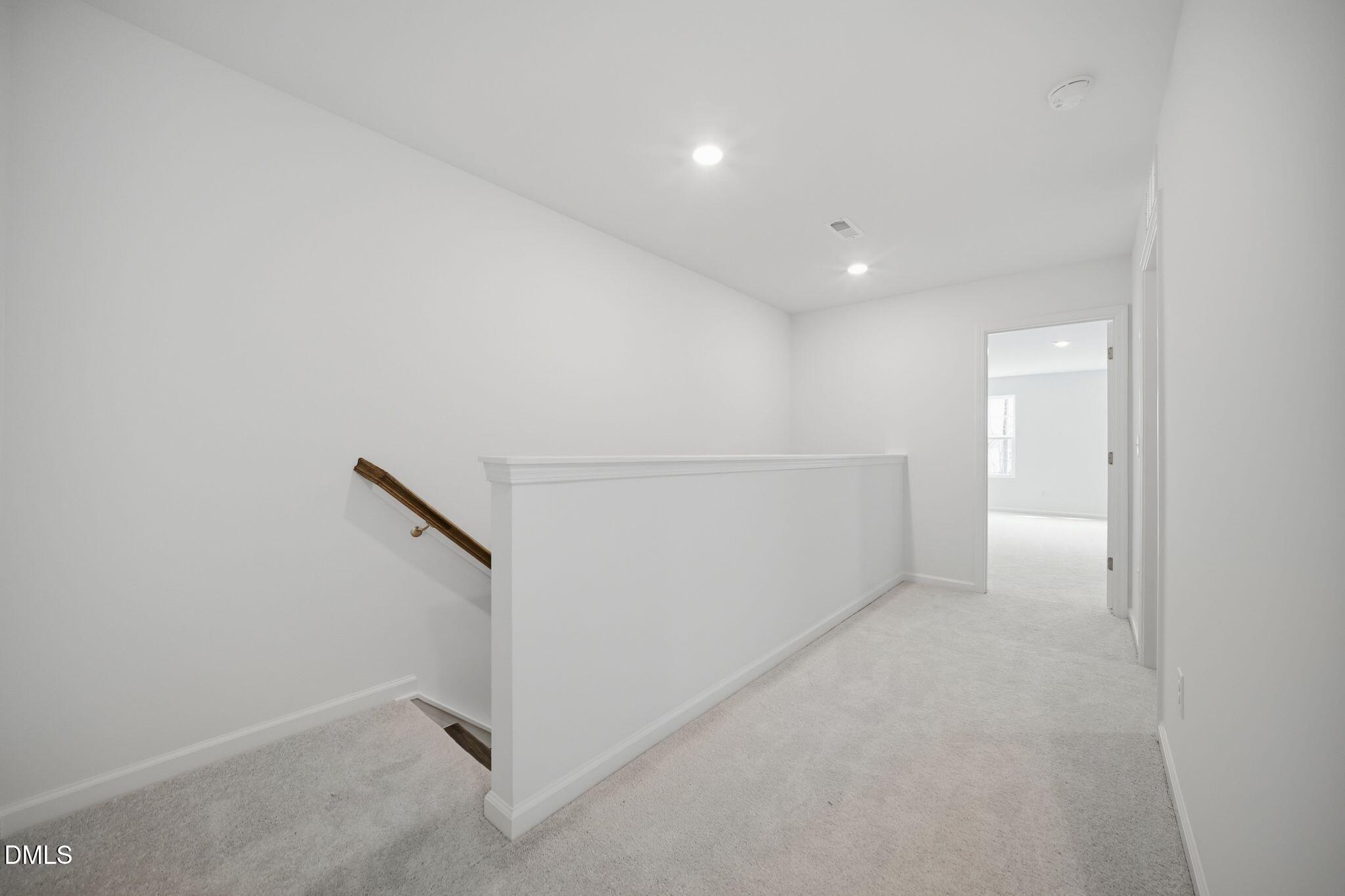 123 Tree Moss Court Rolesville, NC 27571 - Photo 22 of 33 a view of an empty room