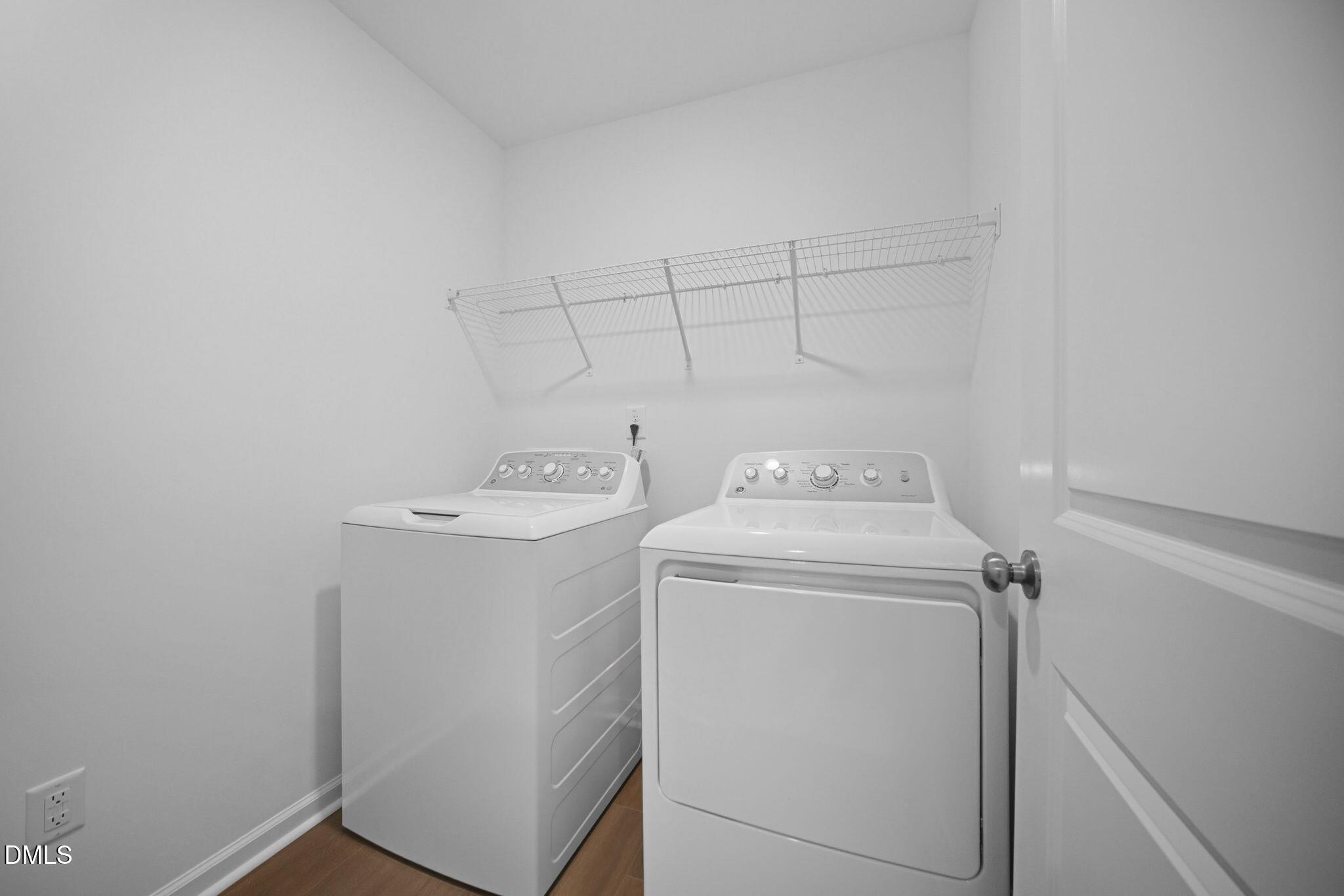 123 Tree Moss Court Rolesville, NC 27571 - Photo 23 of 33 a utility room with dryer and washer