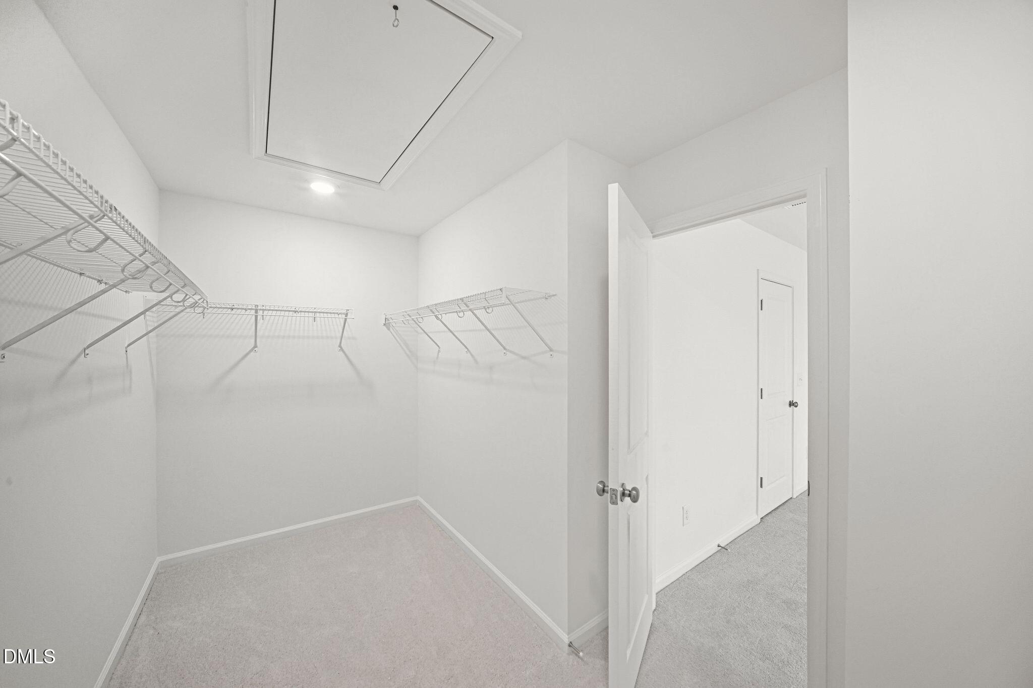 123 Tree Moss Court Rolesville, NC 27571 - Photo 29 of 33 a view of a room with racks on the wall