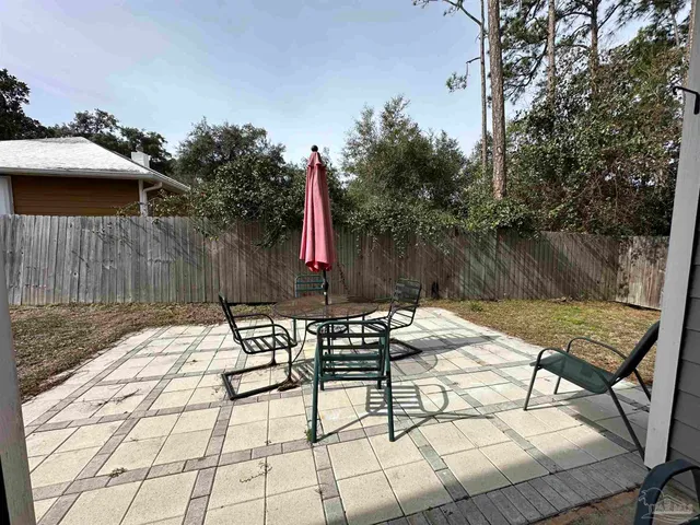 a view of a house with snow on the ground