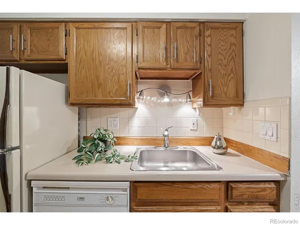 a kitchen with a stove and a microwave