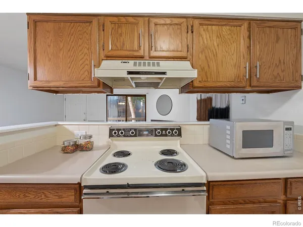 a bedroom with a bed and mirror