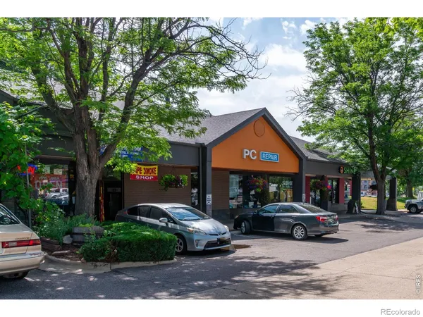 a outdoor living space with furniture and a potted plant