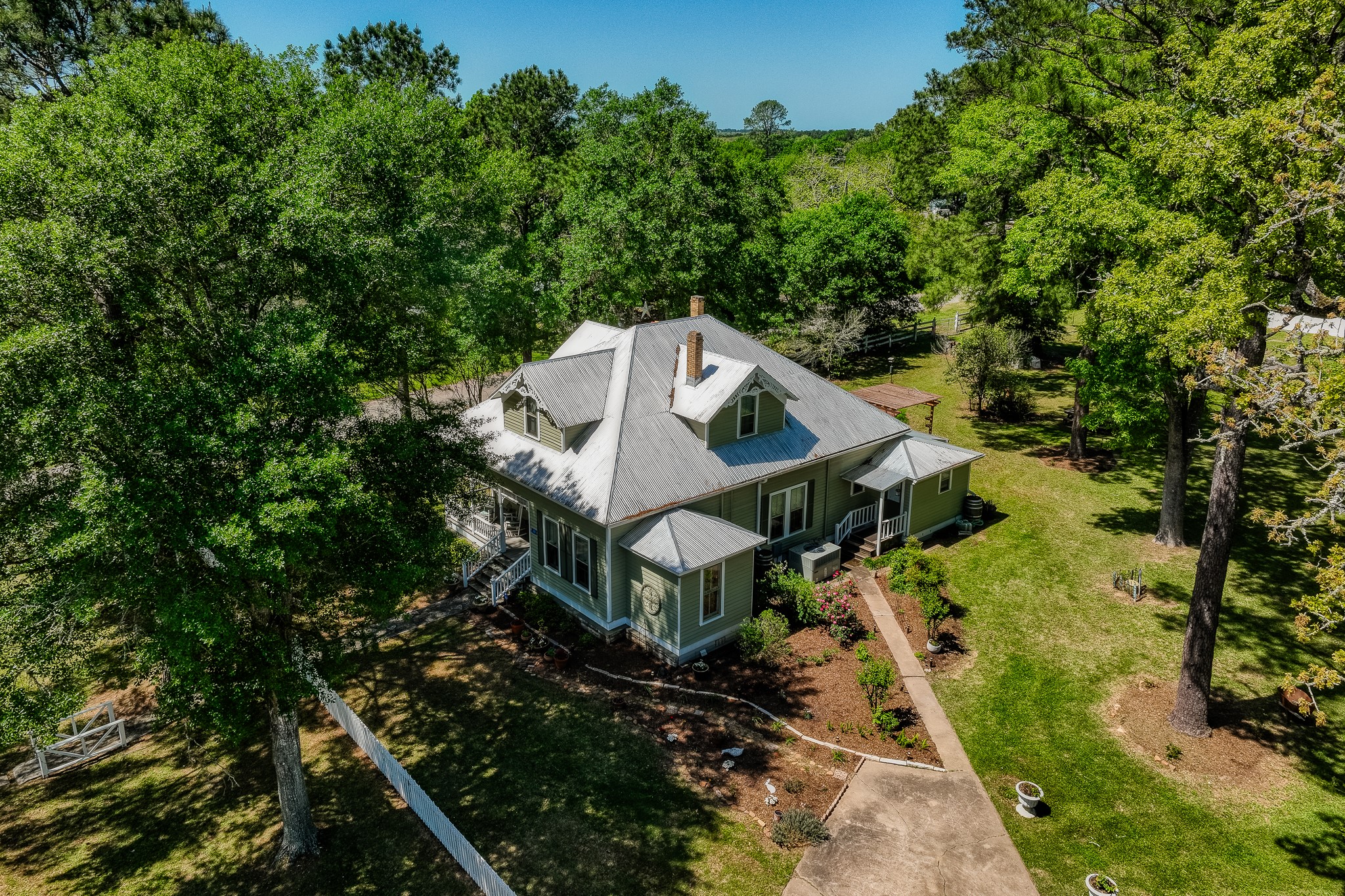 235 Hickory Road New Ulm, TX 78950 - Photo 2 of 43 a view of a house with a yard