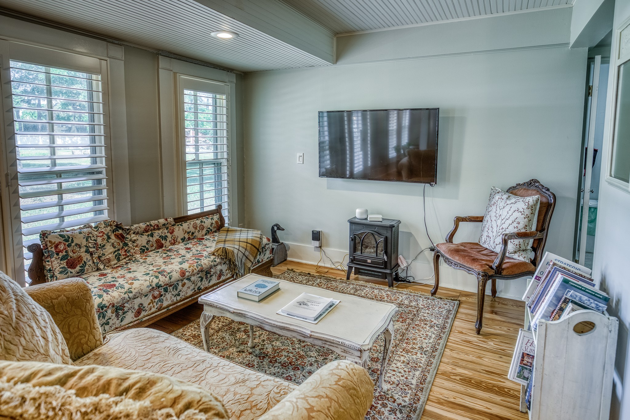 235 Hickory Road New Ulm, TX 78950 - Photo 23 of 43 a living room with furniture and a fireplace