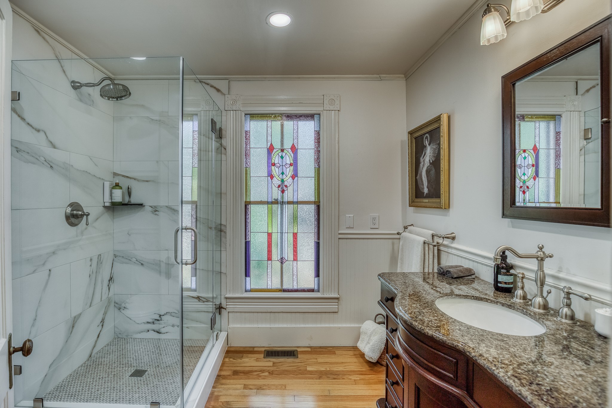235 Hickory Road New Ulm, TX 78950 - Photo 28 of 43 a bathroom with a granite countertop sink mirror and shower