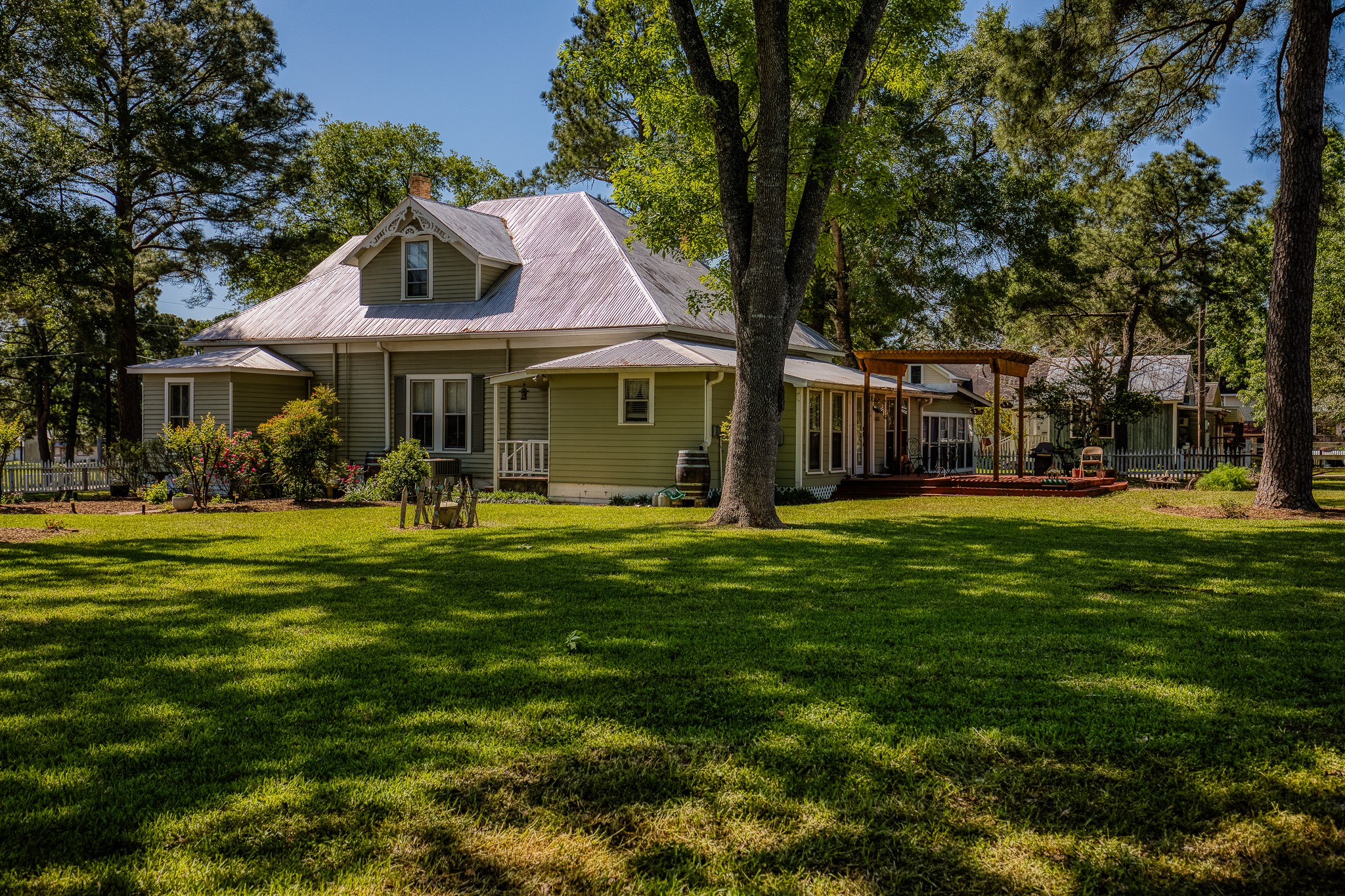 235 Hickory Road New Ulm, TX 78950 - Photo 39 of 43 a front view of a house with a garden